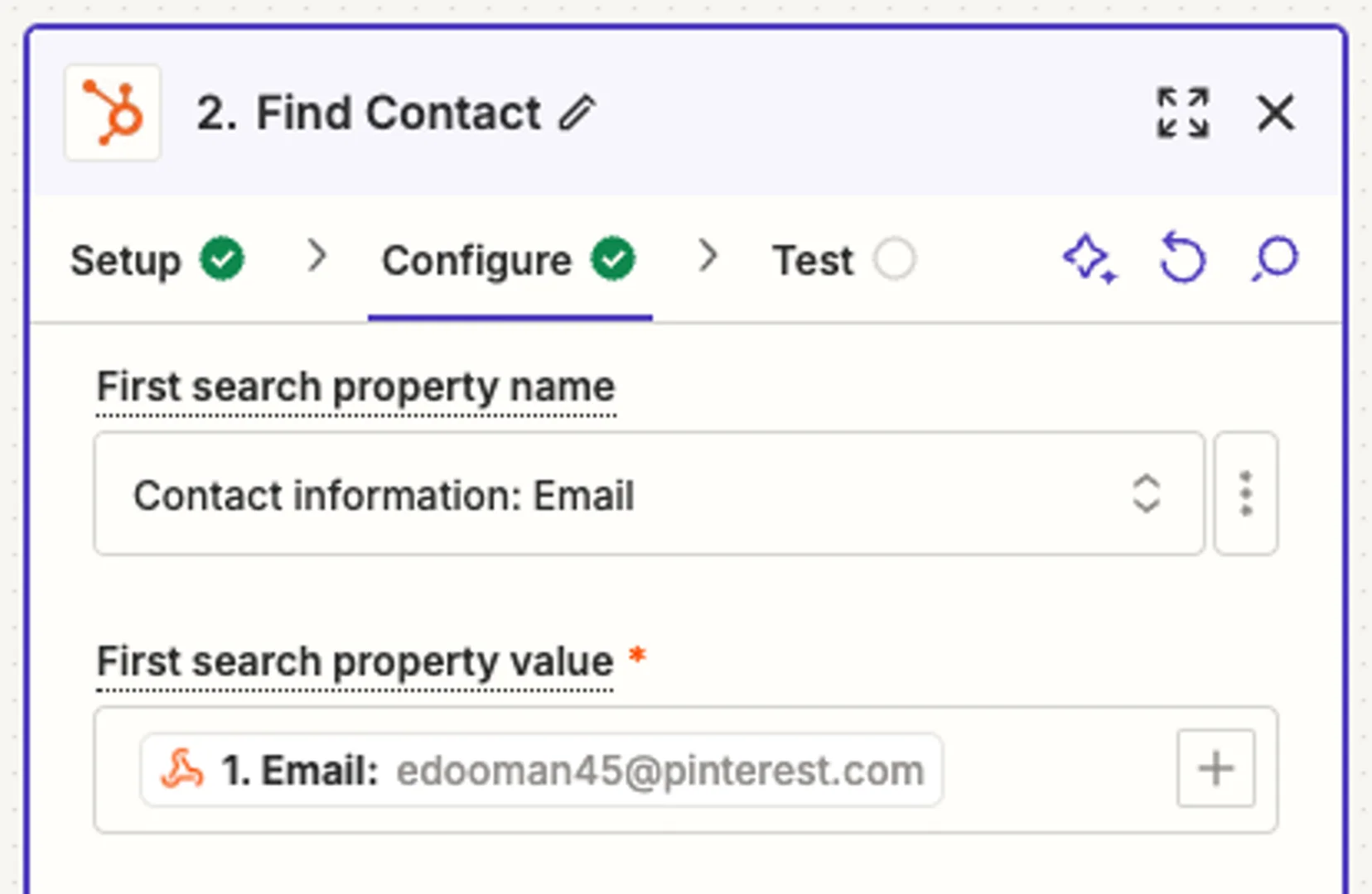 Screenshot showing HubSpot action with email matching configuration